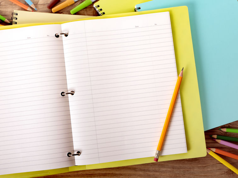 Notebook and pencils, representing hands-on tools to try at home